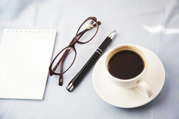 Coffee,notebook,pen and glasses — Stock Photo, Image