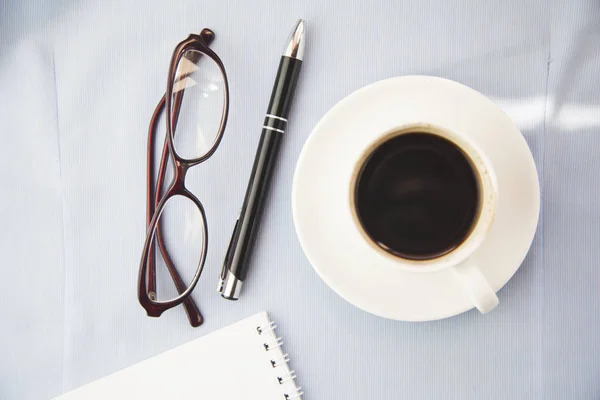 Coffee,notebook,pen and glasses — Stock Photo, Image