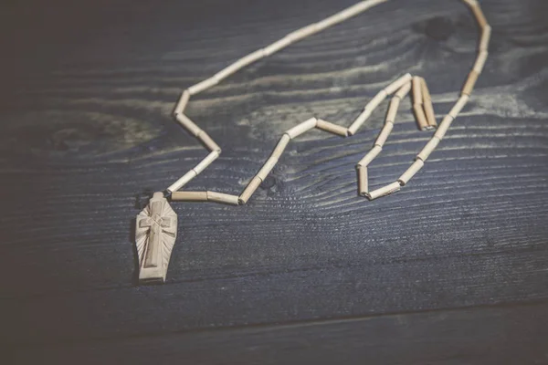 Cross on the table — Stock Photo, Image