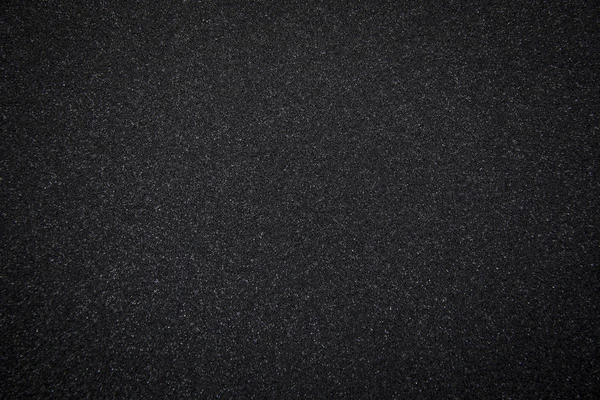 Φόντο μαύρο σφουγγάρι — Φωτογραφία Αρχείου