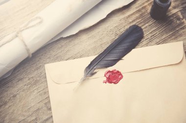 Old feather, envelope, sealing wax clipart