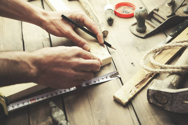 painting frame on man hand
