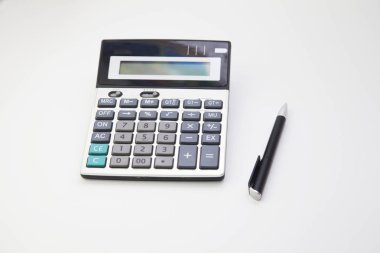 hesap makinesi ve kalem