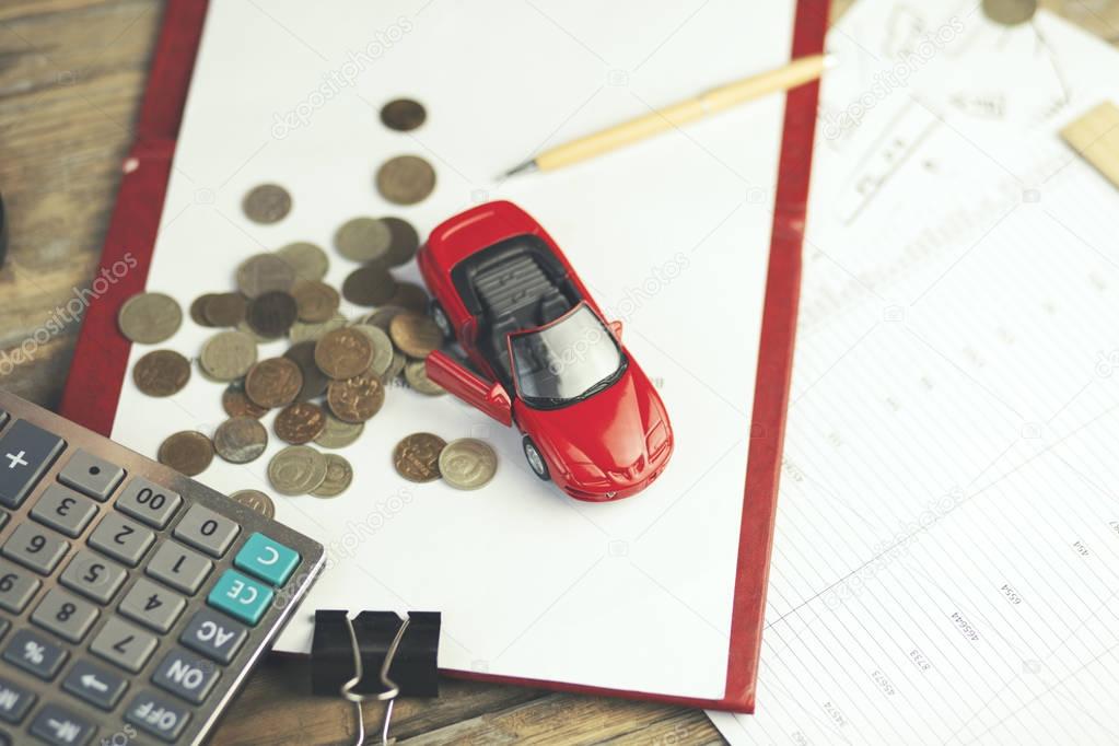 car and money on table