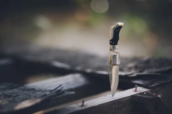 Knife on wood — Stock Photo, Image