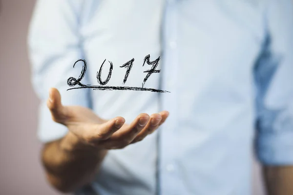 Business man with  year sign — Stock Photo, Image