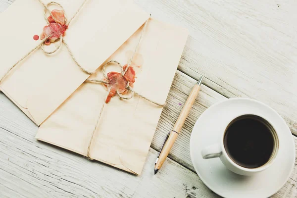 Envelopes on coffee table — Stock Photo, Image