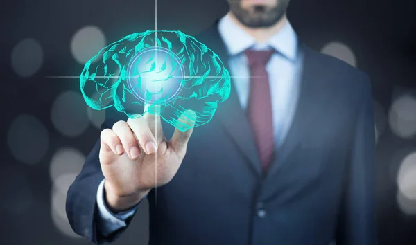 La mano del hombre de negocios tocando cerebro — Foto de Stock