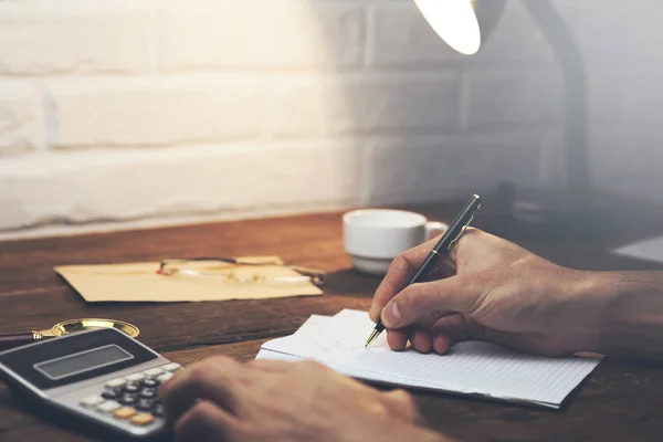 Business man using a calculato — Stock Photo, Image