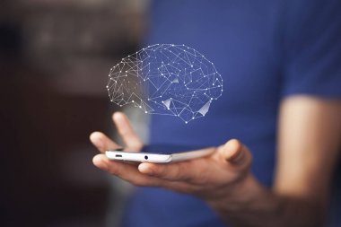 brain over smartphone in  hand clipart