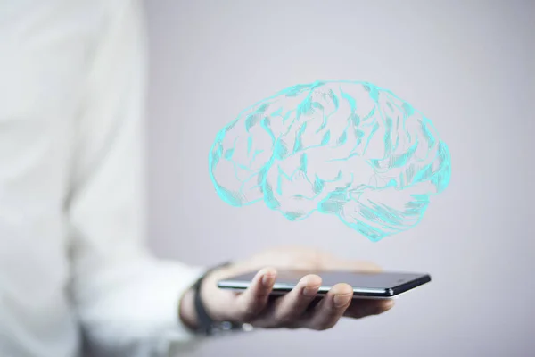 Hombre Sosteniendo Teléfono Con Icono Del Cerebro Por Encima —  Fotos de Stock