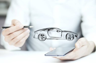 Telefon ve araba simgesi olan işadamı 