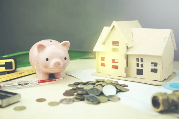Small house with a floor plan and  money — Stock Photo, Image