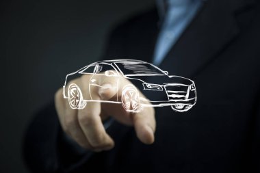 İş adamı ekranda arabaya dokunuyor