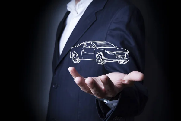 Businessman pressing car in screen — Stock Photo, Image