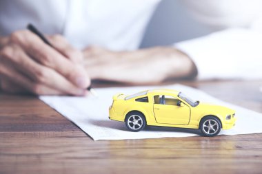 business man hand car and document 