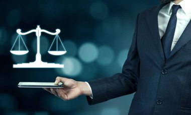 businessman hand tablet with scales in screen