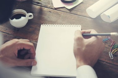 businessman working  hand notepad