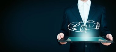 Sanal ekranda araba simgesi olan el tableti.