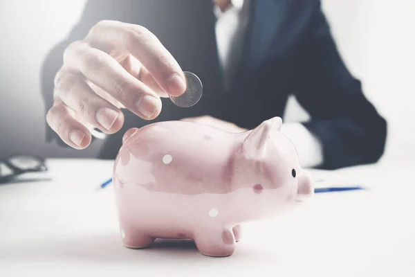 Man Putting Coin Piggy Bank Saving Money Concept — Stock Photo, Image