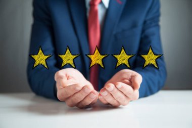 Ekranda insan eli sarı yıldızlar