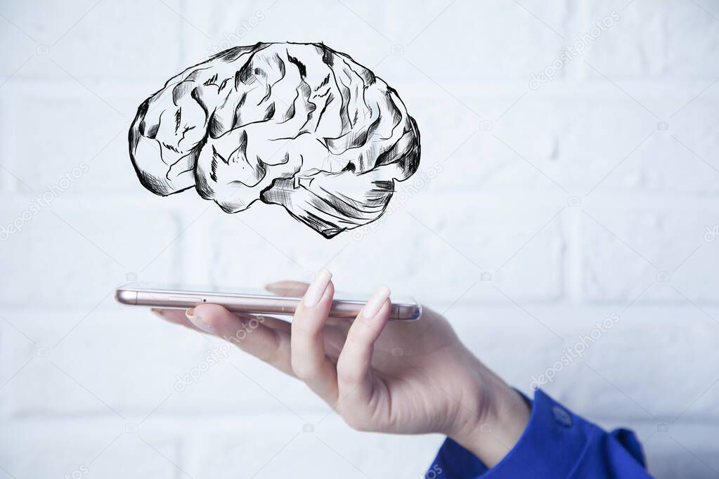 businesswoman holding smart phone with brain in screen