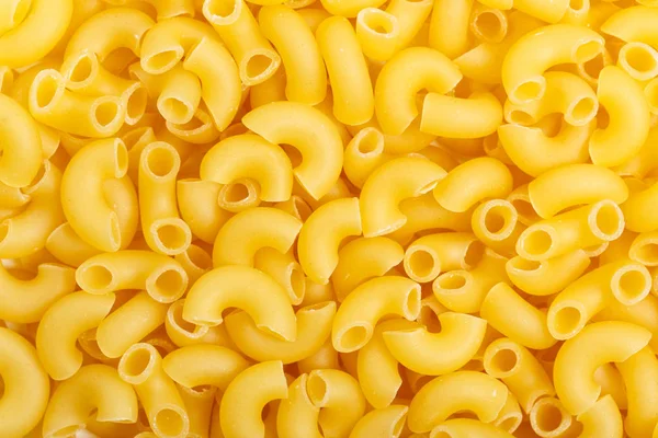 Closeup της άψητα ιταλικά ζυμαρικά - αγκώνα μακαρόνια — Φωτογραφία Αρχείου