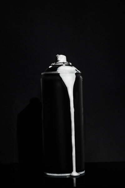 black and white photo of a bottle of water
