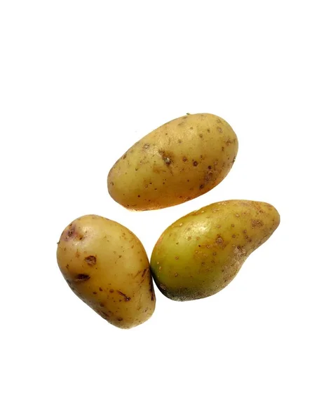 Batatas orgânicas no fundo branco. Conceito de alimentação saudável. Legumes cultivados na Guatemala — Fotografia de Stock