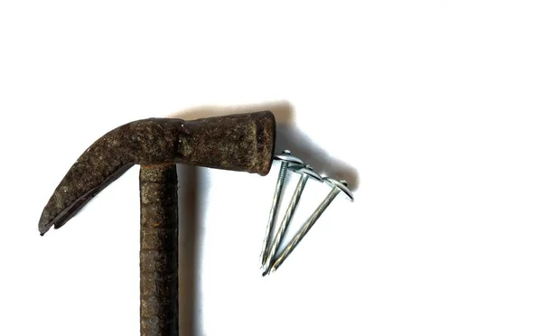 Steel hammer with nails on white background. construction concept — Stock Photo, Image