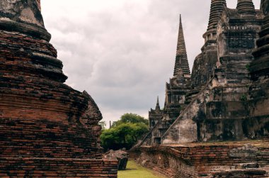 Historic Ancient City of Ayutthaya in Thailand with red brick and stone architecture - Buddhist monasteries in the old city of Siam