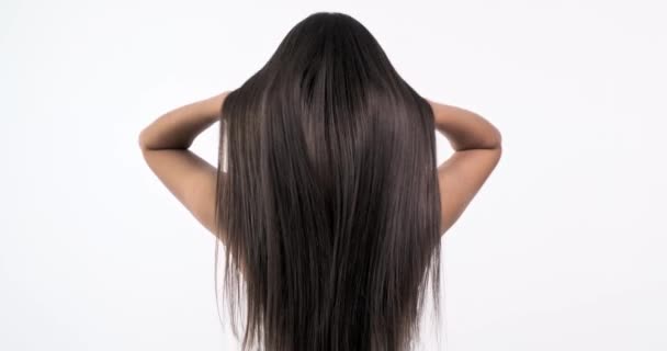 Woman Moves Long Hair Rear View Girl Shakes Long Straight — Stock Video