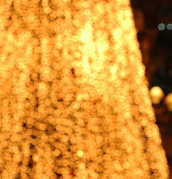 Giallo dorato sfocato Natale Capodanno festivo l — Foto Stock