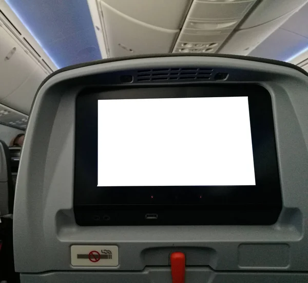 Pantalla de entretenimiento personal del asiento en el avión — Foto de Stock