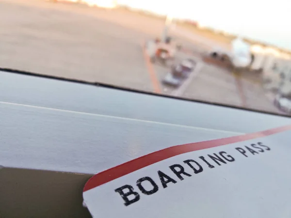 Boarding pass ticket at the airport terminal — Stock Photo, Image