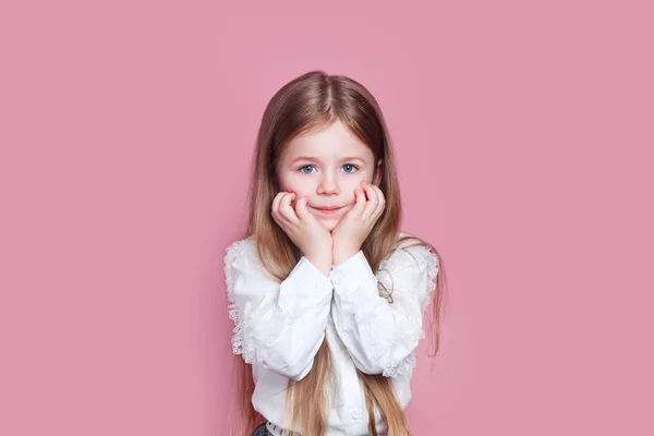 Charming adorable little girl holding hands under her chin — 스톡 사진