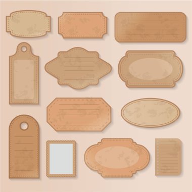 Eski bir kağıt seti. Antika albümler ve eski resimli kitap artıkları. Eski kağıt nesneler, kahverengi kağıt dokular ve çizimler. Yerleşimleriniz için farklı eski kağıt nesneleri.