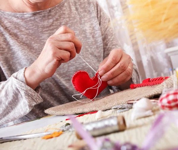 Adult woman doing handmade crafts