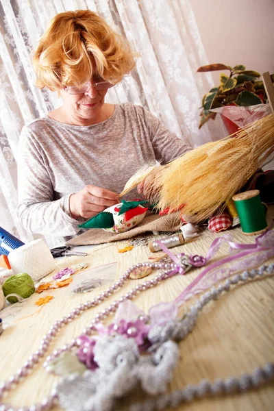 Adult woman doing handmade crafts