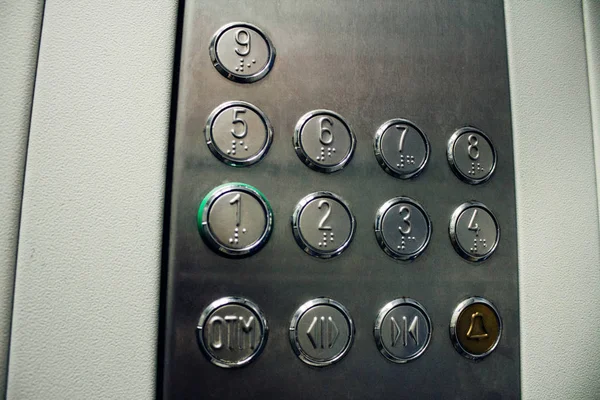 The elevator buttons in the business building