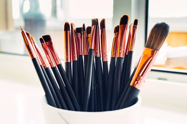 Professional make-up tools: Make-up brushes isolated on white background