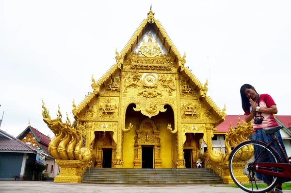 Traveler thai woman travel and praying at Wat Sri Pan Ton n Nan,