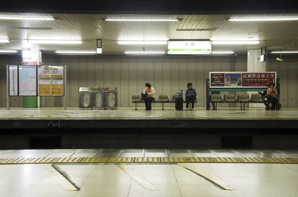 Japanese people and foreigner traveller waiting subway train go — Stock Photo, Image