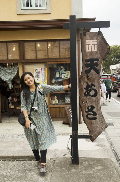 Traveler thai women standing and posing at label pole in Kawagoe — Stock Photo, Image