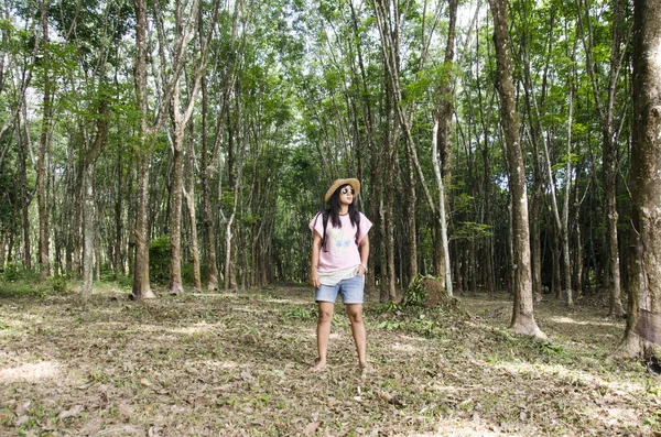 Thai women portrait and travel in seringueira or rubber tree pla — Stock Photo, Image