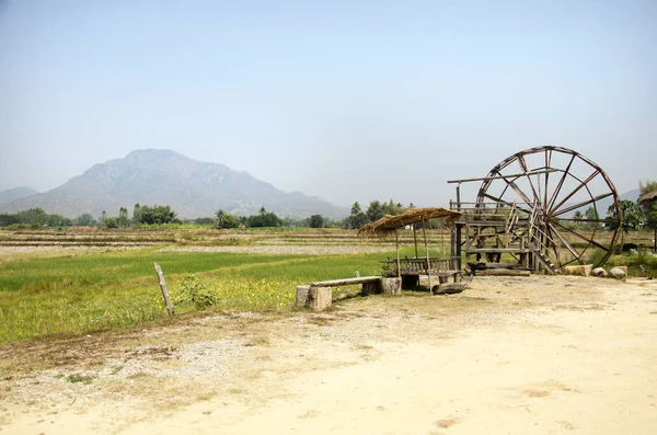 Thai Dam Cultural Village and big wooden turbine baler water whe — Stock Photo, Image
