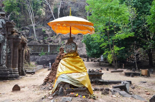 Ruins buddha statue image in archaeological site at Vat Phou or — Stock Photo, Image