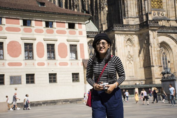 Asian thai woman travel and posing for take photo inside of Prag