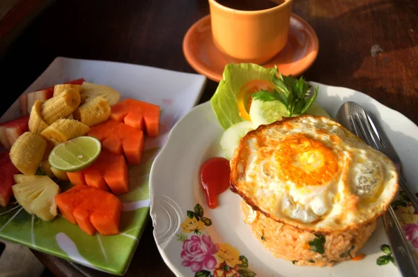 American Breakfast or Continental Breakfasts Bali style in dining room in morning time for travelers and guest people eat and drinks at resort hotel in Bali, Indonesia