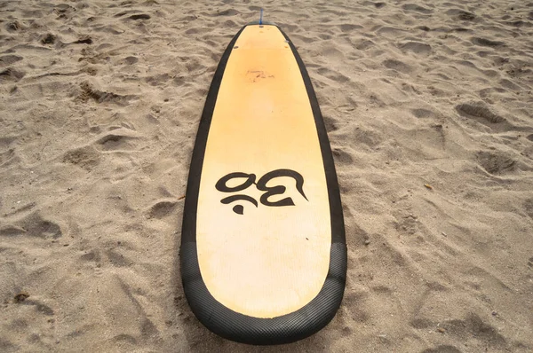 BALI, INDONESIA - MARCH 25 : Balinese people sale and rent surfboard shop on beach for Indonesian people and foreign travelers travel visit and relax at Kuta Beach on March 25, 2018 in Bali, Indonesia